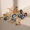 Wholesale Women's Stainless Steel Geometric Blue Eye Pendant Earrings With Electroplating Treatment