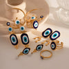 Wholesale Women's Stainless Steel Geometric Blue Eye Pendant Earrings With Electroplating Treatment