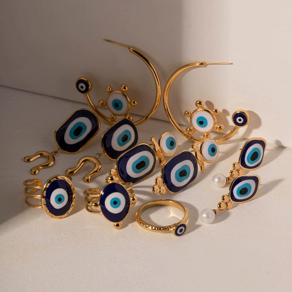 Wholesale Women's Stainless Steel Geometric Blue Eye Pendant Earrings With Electroplating Treatment