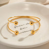 Wholesale Women's Stainless Steel Geometric Double Ball Open Bracelet With Cross Design And Electroplating Treatment