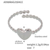 Wholesale Women's 316L Stainless Steel Geometric Fashion Ring With 18K Real Gold Electroplating
