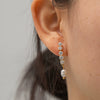 Wholesale Women's Stainless Steel Geometric Inlaid Zircon Freshwater Pearl Ear Row Tassel Ear Studs Jewelry