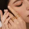 Wholesale Women's Stainless Steel Geometric Interlocking Hollow Finger Ring Gold Plated