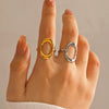 Wholesale Women's Stainless Steel Geometric Oval Hollow Adjustable Ring With Electroplating
