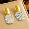 Wholesale Women's Stainless Steel Geometric Oval Pleated Ginkgo Leaf Electroplated Earrings