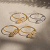 Wholesale Women's Stainless Steel Geometric Pattern Electroplated Microinlaid Zircon Ferris Wheel Fourleaf Flower Opening Finger Ring