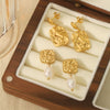 Wholesale Women's Stainless Steel Geometric Pleated Textured Pearl Earrings With Electroplating