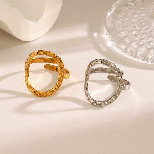 Wholesale Women's Stainless Steel Geometric Round Hollow Opening Hammered Finger Ring With Electroplating And Retro Temperament