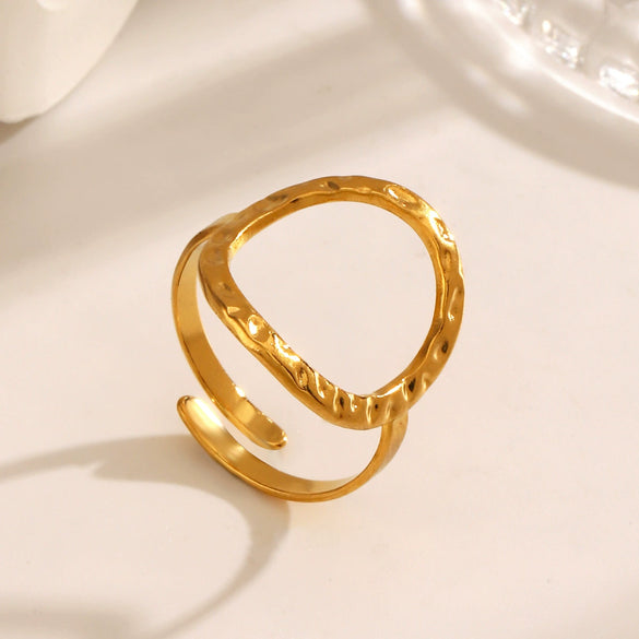 Wholesale Women's Stainless Steel Geometric Round Hollow Opening Hammered Finger Ring With Electroplating And Retro Temperament