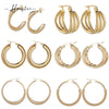 Wholesale Women's Stainless Steel Geometric Three Layer Hollow Tassel Earrings With Electroplating Design