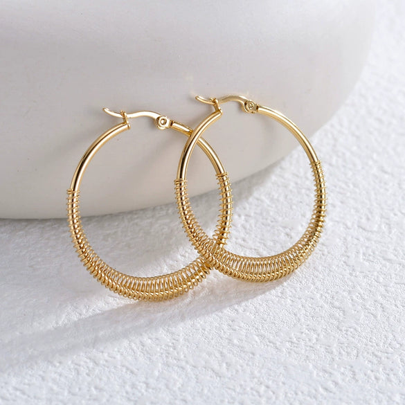 Wholesale Women's Stainless Steel Geometric Three Layer Hollow Tassel Earrings With Electroplating Design