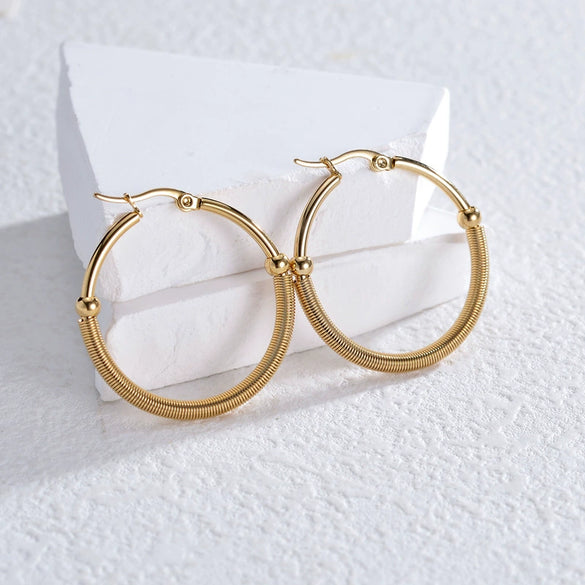 Wholesale Women's Stainless Steel Geometric Three Layer Hollow Tassel Earrings With Electroplating Design