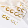 Wholesale Women's Stainless Steel Geometric Twisted Winding C Ring Earrings With Electroplating