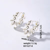 Wholesale Women's Stainless Steel Geometric Ushaped Hollow Exaggerated Simple Silver Glossy Electroplated Earrings