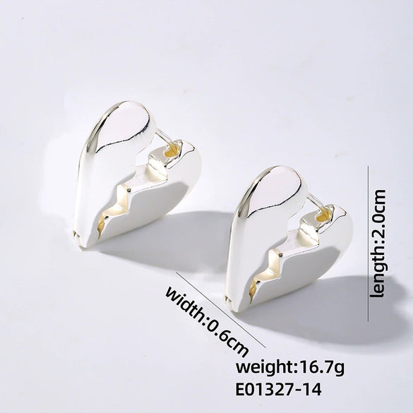Wholesale Women's Stainless Steel Geometric Ushaped Hollow Exaggerated Simple Silver Glossy Electroplated Earrings