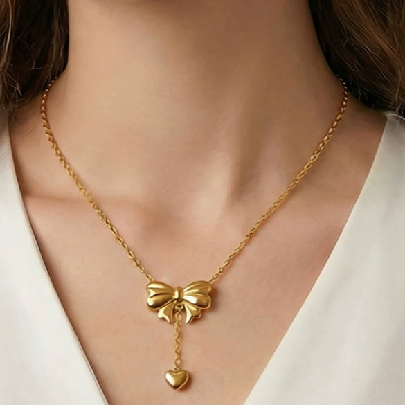 Wholesale Women's Stainless Steel Goldplated Heart Pendant Necklace And Earrings Jewelry Set With Bowknot And Tassel