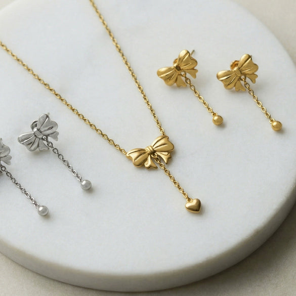 Wholesale Women's Stainless Steel Goldplated Heart Pendant Necklace And Earrings Jewelry Set With Bowknot And Tassel