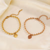 Wholesale Women's Stainless Steel Heartshaped Love Bracelet With Round Beads And Electroplating