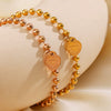 Wholesale Women's Stainless Steel Heartshaped Love Bracelet With Round Beads And Electroplating