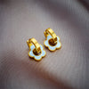 Wholesale Women's Stainless Steel Hollow Flower Shape Earrings With White Shell Electroplated