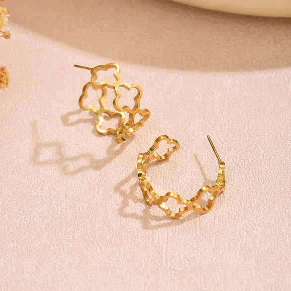 Wholesale Women's Stainless Steel Hollow Fourleaf Clover And Flower Earrings With 18K Gold Vacuum Plating