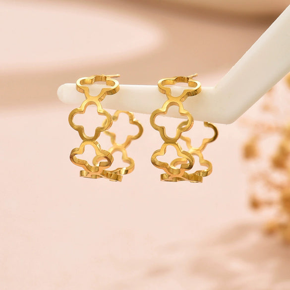 Wholesale Women's Stainless Steel Hollow Fourleaf Clover And Flower Earrings With 18K Gold Vacuum Plating