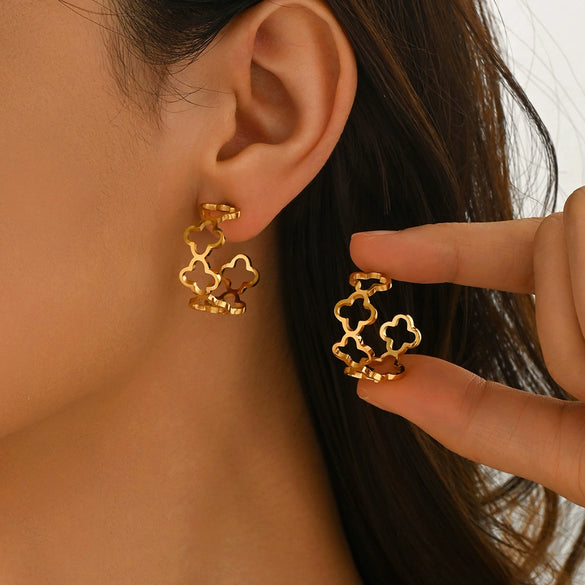 Wholesale Women's Stainless Steel Hollow Fourleaf Clover And Flower Earrings With 18K Gold Vacuum Plating
