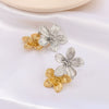 Wholesale Women's Stainless Steel 18K Gold Plated Flower Design Earrings With Advanced Design Sense And Retro Style