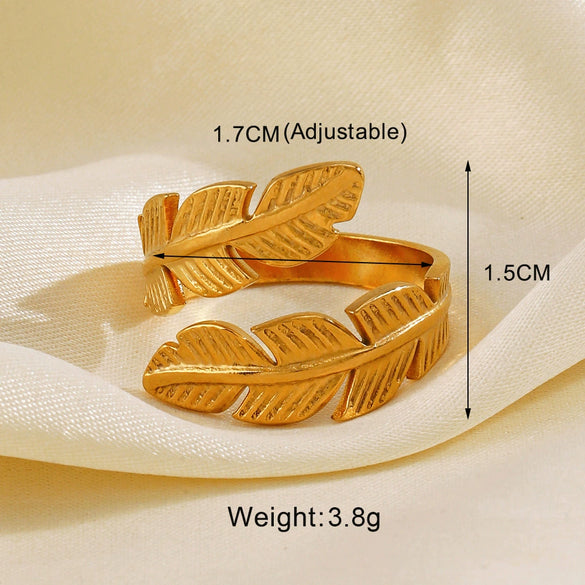 Wholesale Women's Stainless Steel Leaf Geometric Lines Cross Opening Adjustable Ring With Electroplating