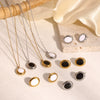 Wholesale Women's Stainless Steel Light Luxury Niche Design Cross Cat Eye Drop Oil Necklace Earrings Suit With Ellipse Pattern And Vacuum Real Gold Electroplating In Pvd Furnace