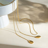 Wholesale Women's Stainless Steel Ocean Series Geometric Shell Pendant Necklace With Electroplating
