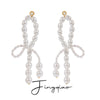 Wholesale Women's Stainless Steel Pearl Diamond Irregular Winding Geometric Style Electroplated Earrings