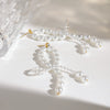 Wholesale Women's Stainless Steel Pearl Diamond Irregular Winding Geometric Style Electroplated Earrings