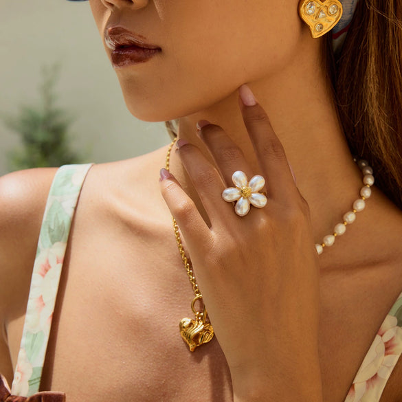 Wholesale Women's Stainless Steel Pearl Fivepetal Flower Opening Ring With Geometric Pattern And Electroplating Design