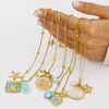 Wholesale Women's Stainless Steel Pearl Necklace And Shell Earrings Set With Lotus Painted Oil Drop Pendant 18K Vacuum Gold Plated