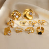 Wholesale Women's Stainless Steel Pearl Zircon Hollow Geometric Opening Starfish Shell Ring Electroplated
