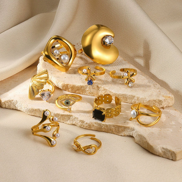 Wholesale Women's Stainless Steel Pearl Zircon Hollow Geometric Opening Starfish Shell Ring Electroplated