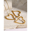 Wholesale Women's Stainless Steel Pendant Necklace And Earrings With Twisted Love Line Design