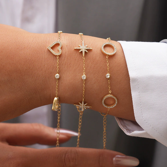 Wholesale Women's Stainless Steel Real Gold Plated Bracelet With Heart Circle And Eight Pointed Star Design
