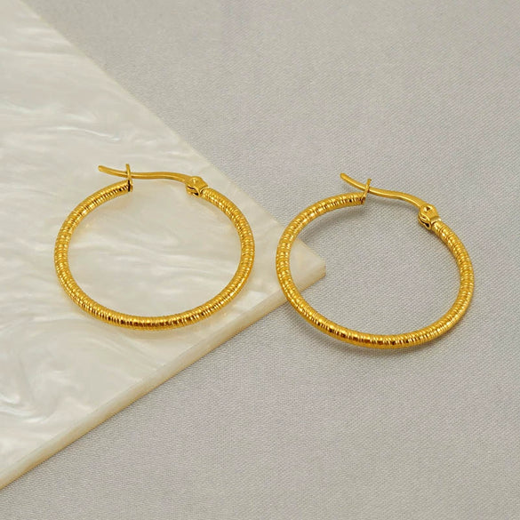Wholesale Women's Stainless Steel Round Geometric Retro Fashion Earrings With Electroplating