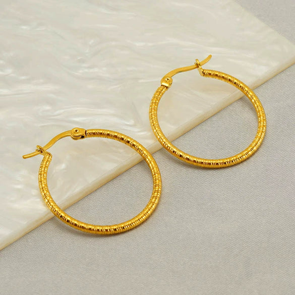 Wholesale Women's Stainless Steel Round Geometric Retro Fashion Earrings With Electroplating