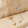 Wholesale Women's Stainless Steel V Shaped Letter Necklace With Snake Bone Chain And Electroplating