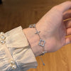 Wholesale Women's 925 Sterling Silver Light Luxury Style Fourleaf Clover Hollow Bracelet With Horse Eye Stone And Electroplating