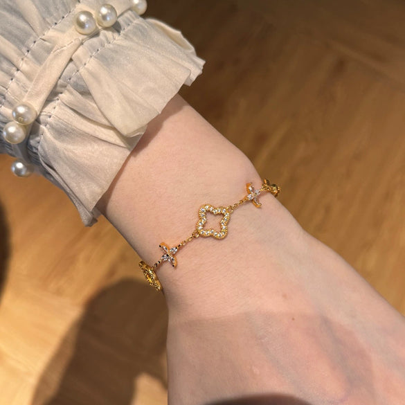 Wholesale Women's 925 Sterling Silver Light Luxury Style Fourleaf Clover Hollow Bracelet With Horse Eye Stone And Electroplating