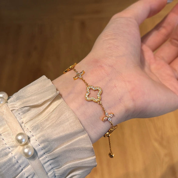 Wholesale Women's 925 Sterling Silver Light Luxury Style Fourleaf Clover Hollow Bracelet With Horse Eye Stone And Electroplating