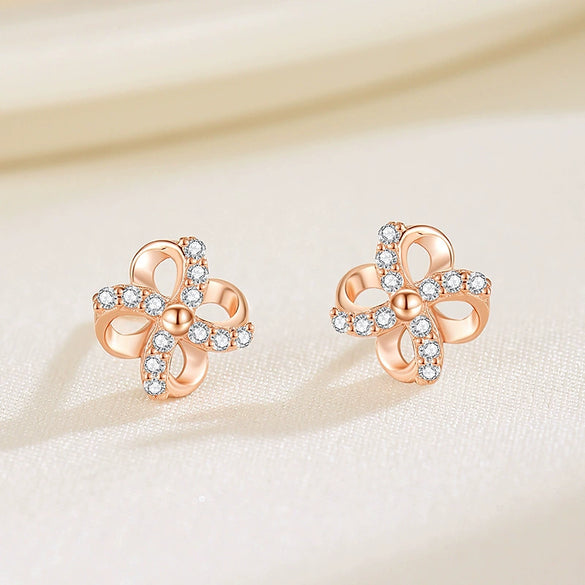 Wholesale Women's 925 Sterling Silver Rotating Windmill Flower Four Leaf Clover Geometric Style Ear Studs