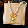 Wholesale Women's Sweet And Cool Style Goldplated Stainless Steel Flower Pattern Regular Chain Necklace