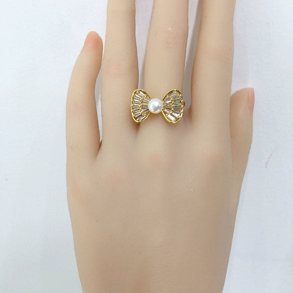 Wholesale Women's Sweet And Cute Bowknot Zircon Freshwater Pearl Ring Copper With 18K Real Gold Electroplated