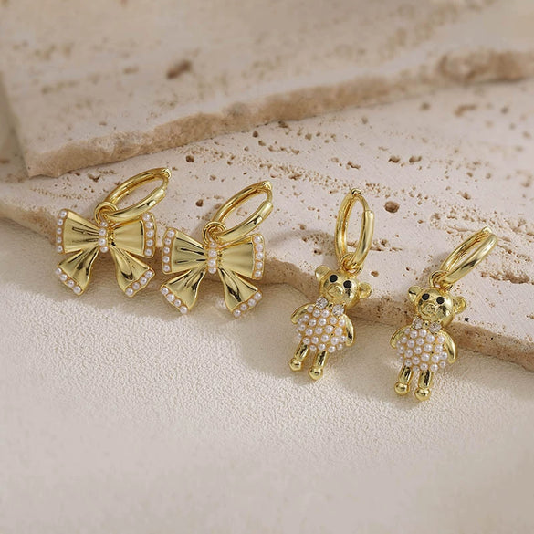 Wholesale Women's Sweet Copper Inlaid Pearl Animal Zodiac Bow Earrings