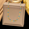 Wholesale Women's Sweet Fashionable Nonfading Electroplated Titanium Steel Necklace With Heart And Flower Patterns